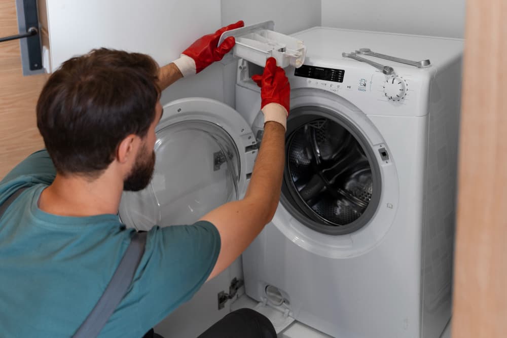 Professional appliance technician at work